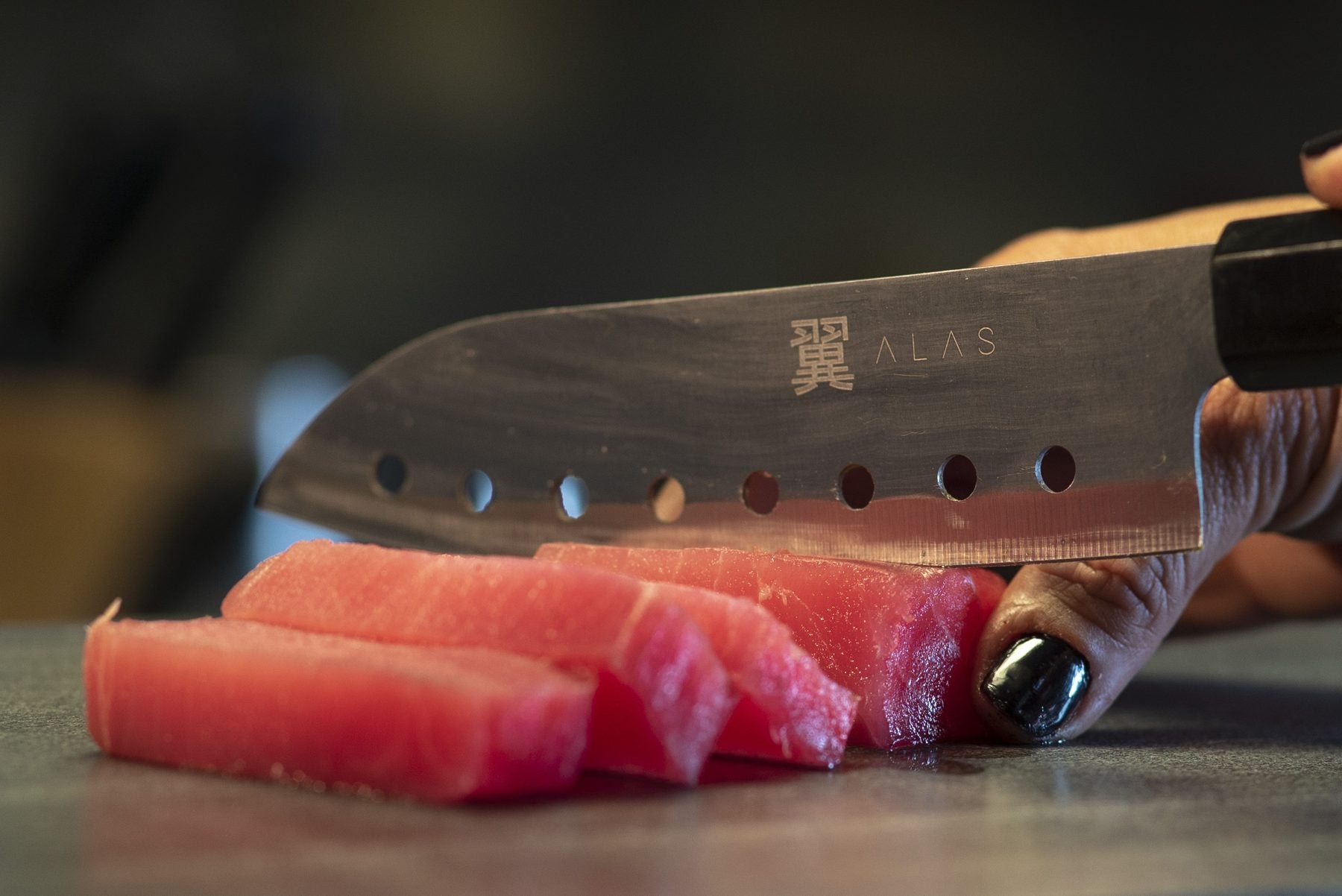 Slicing fish with the Alas sushi knife